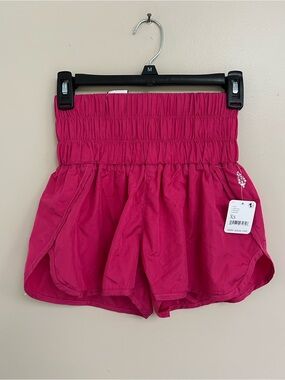 FP Movement by Free People Smocked High-Waist Athletic Shorts in Raspberry